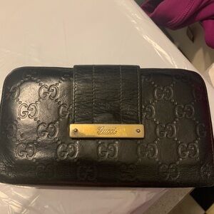 Gucci Black Leather Wallet with Gold Accents